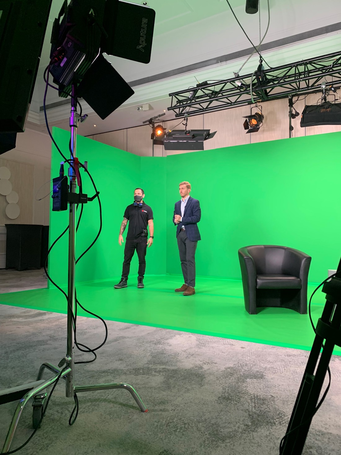 people in front of green screen