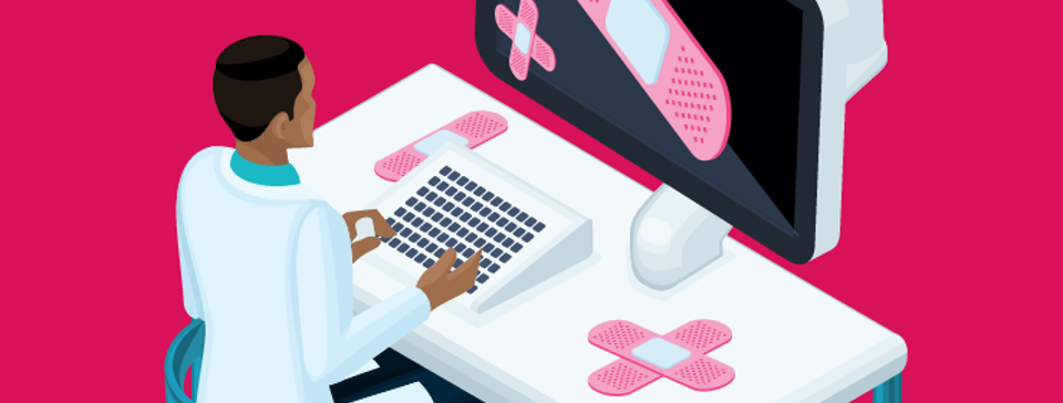 man at computer with band aid over it