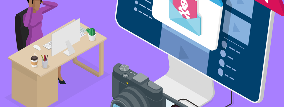 woman looking at computer screen with piracy email